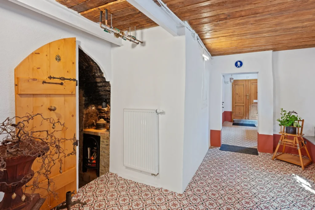 Hallway with fireplace