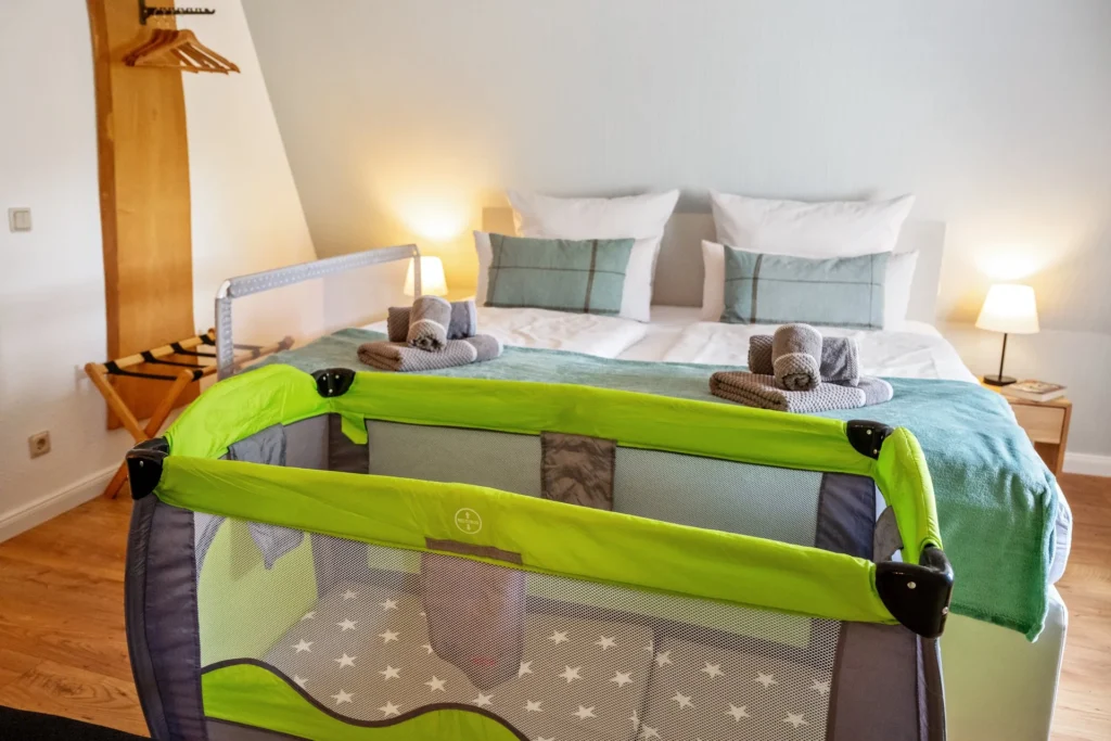 Bedroom 1 with travel cot
